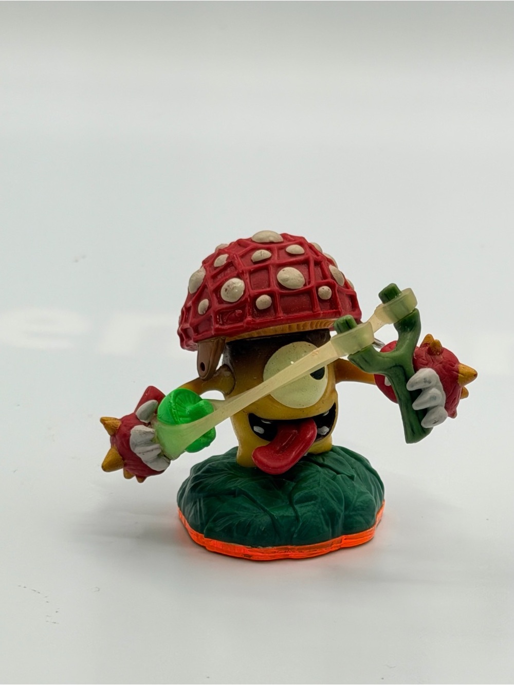 Red Mushroom Slingshot Character Toy with Green Base